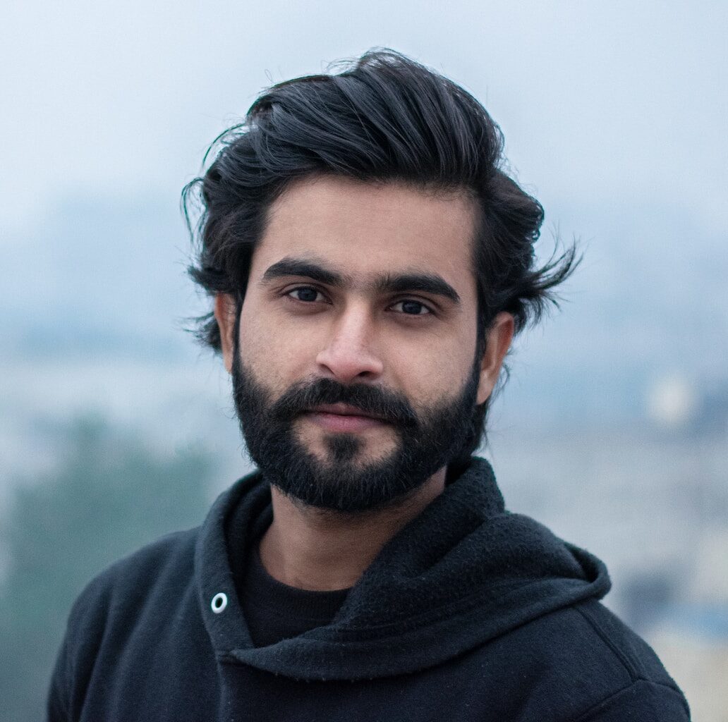 man in black zip up jacket