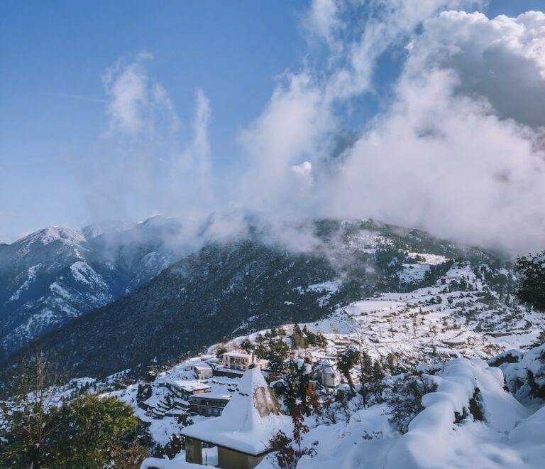 snow covered mountain under blue sky during daytime